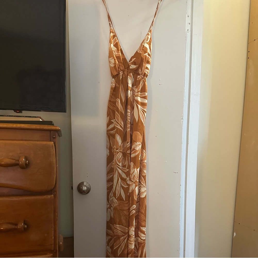 Women’s small tropical floral adjustable maxi dress in desert orange and cream.